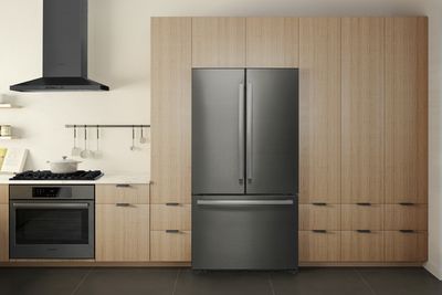 A kitchen featuring Bosch black stainless steel appliances