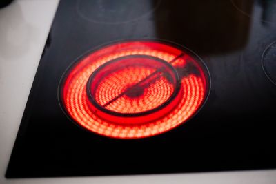 A close-up of an electric cooktop element 