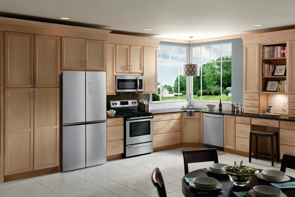 The Frigidaire FRQG1721AV refrigerator in a kitchen 
