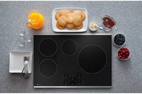 The GE Profile PHP9030STSS induction cooktop featured with breakfast foods