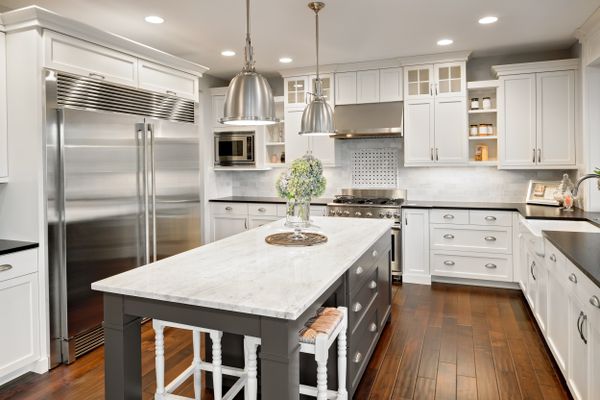 A modern farmhouse kitchen with island 