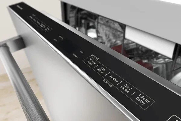 A close-up of the KitchenAid KDTM604KPS dishwasher