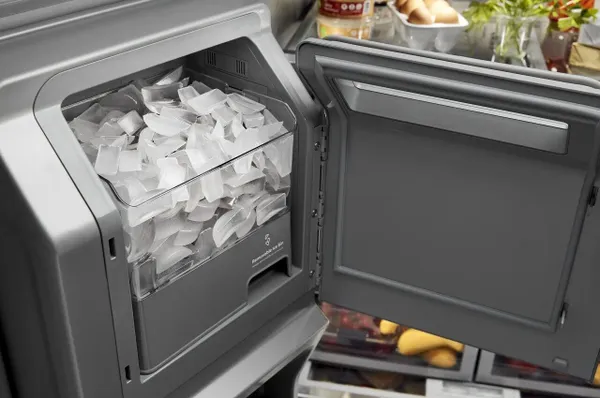 A close-up of the KitchenAid KRMF706ESS refrigerator In-Door-Ice System