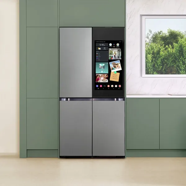 The Samsung RF23DB9900QD refrigerator in a kitchen 