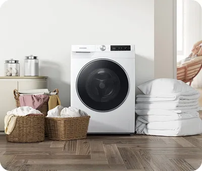 The Samsung WW25B6900AW washer with laundry 