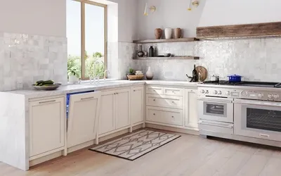 The Thermador Star Sapphire DWHD661EPR dishwasher with a panel front in a luxury kitchen 