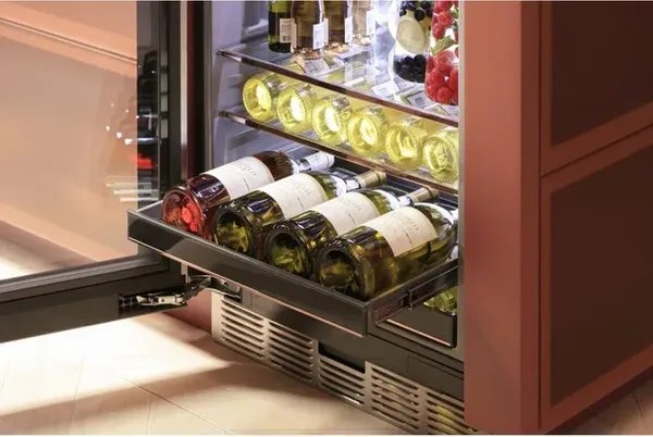 The Cafe CCR06BM2PS5 beverage center with select wines and beverages