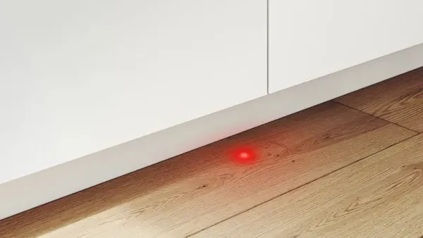The Bosch InfoLight cast on a floor 
