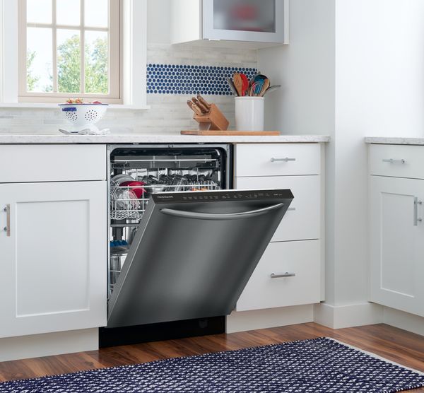 A Frigidaire Gallery black stainless dishwasher in a kitchen 