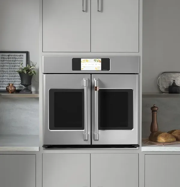 The Cafe CTS90FP2NS1 French door oven featured in a kitchen 