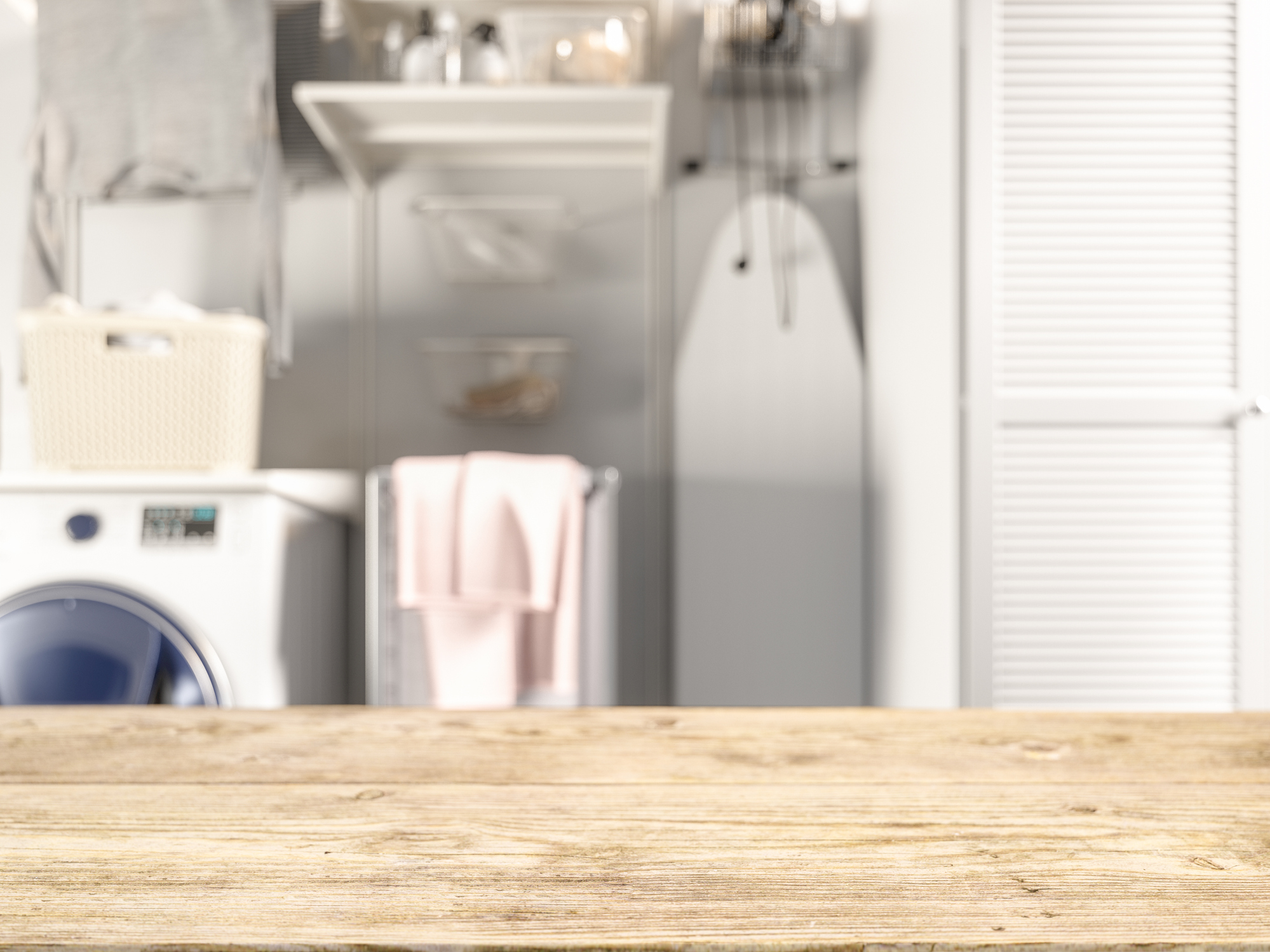 A blurred view of a laundry room in the background 