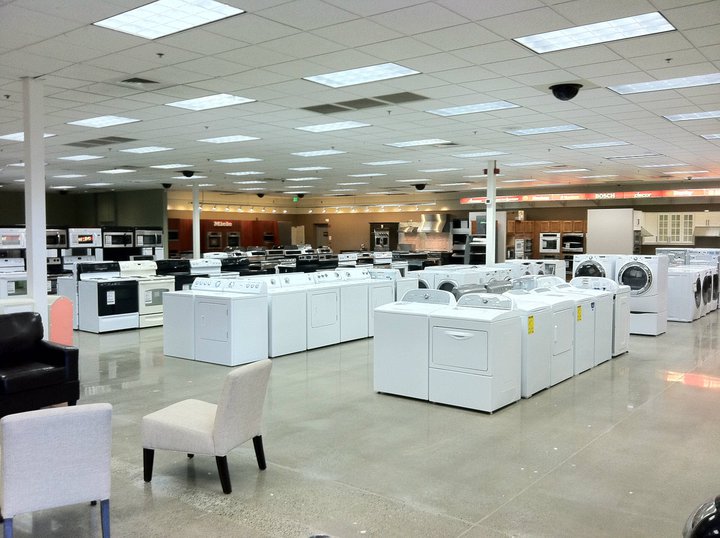 A wide shot of appliances in an Albert Lee appliance store 
