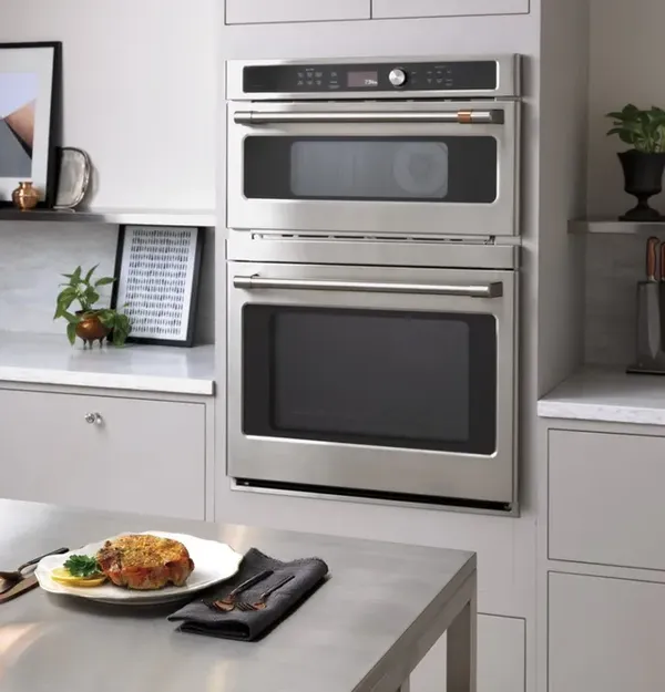 The Cafe CTC912P2NS1 microwave wall oven in a modern kitchen 