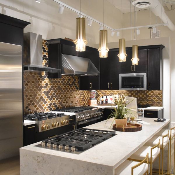 An Arizona Appliance & Home showroom featuring a variety of cooking appliances 