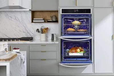 The LG WDEP9423F double oven with its doors open 