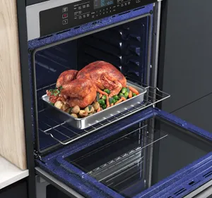 A close-up of a turkey inside of the Samsung NV51T5511DS double oven