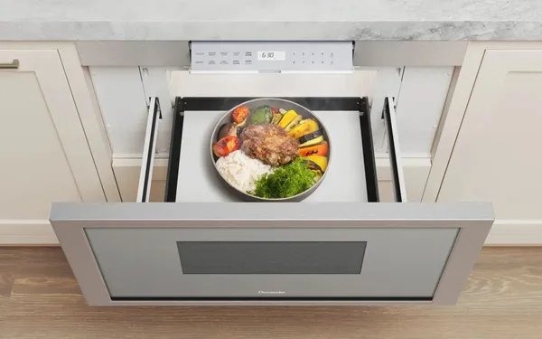 Overhead view of the Thermador MD30BS microwave drawer open with a plate inside 