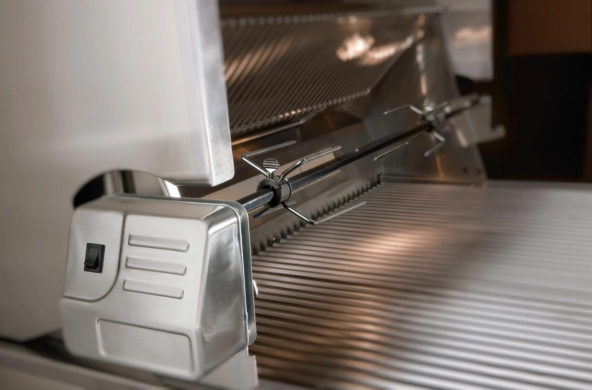 A close-up of the rotisserie in the Wolf OG36-LP grill