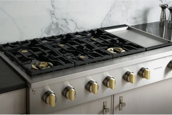 A close-up of the Monogram ZGU486NDTSS rangetop 