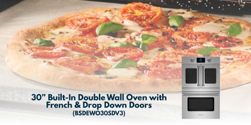 Image of BlueStar's 30” Built-In Double Wall Oven with French and Drop Down Doors (BSDEWO30SDV3) in a luxury kitchen.
