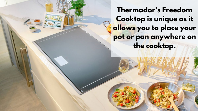 A Thermador Freedom induction cooktop shown with food and beverages 
