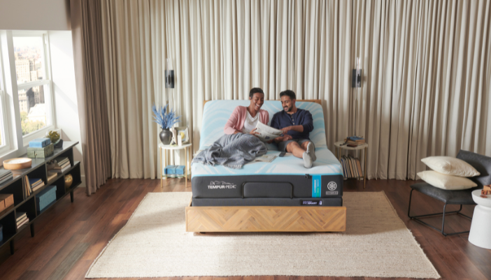 woman and man enjoying a tempur-ergo base