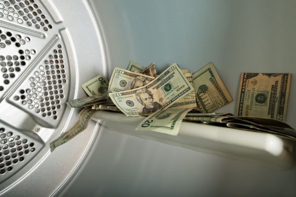 A bundle of $20 bills in a dryer 