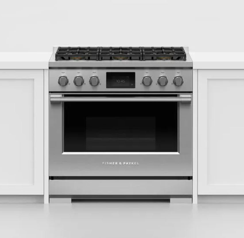 Fisher & Paykel range with surrounding white cabinetry 