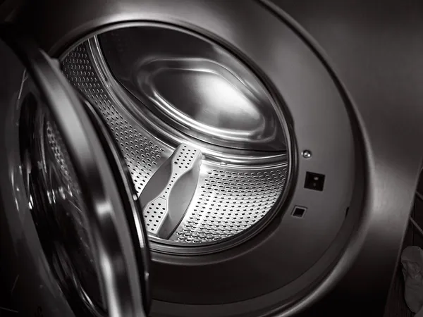 A close-up of the ASKO W6124XW washer door and drum