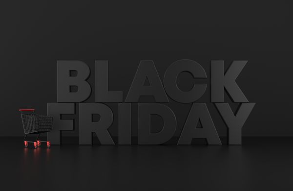 A black background with Black Friday block text next to a shopping cart 