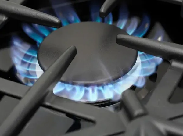 A close-up of a gas burner on the BlueStar RCS36SBV2LCC range 