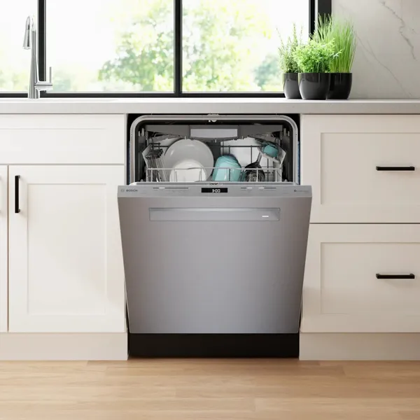 An open Bosch 800 Series SHP78CP5N dishwasher in a kitchen