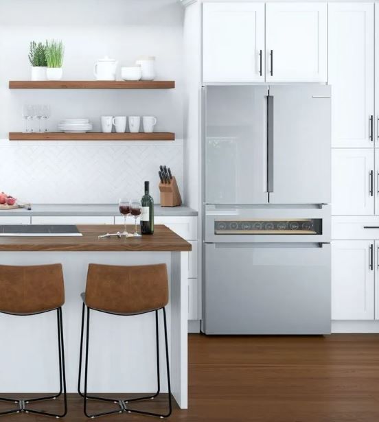 A kitchen featuring a Bosch counter depth refrigerator