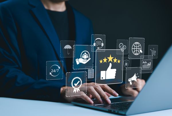 Graphic overlays atop a man using a laptop