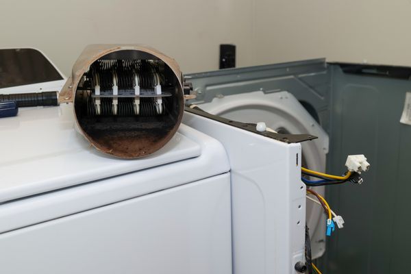 A broken dryer heating element on a dryer 