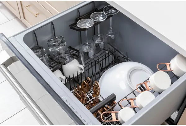 A close-up of dishes inside the Cafe CDD220P4WW2 drawer dishwasher 