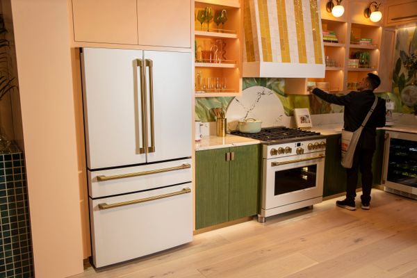 A Cafe matte white refrigerator in a modern kitchen 