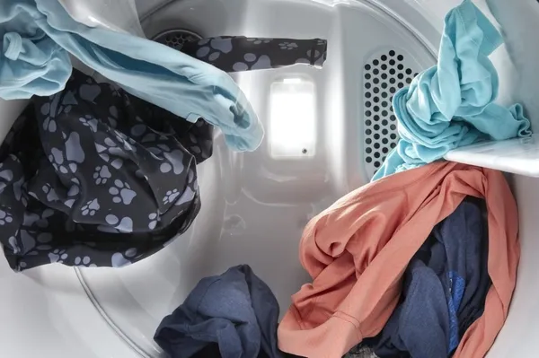 Clothes tumbling inside the Maytag MGD6500MW dryer