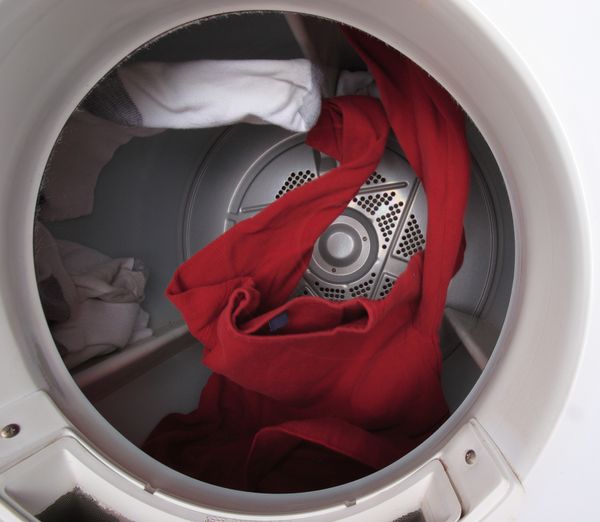 Clothes tumbling in a dryer 