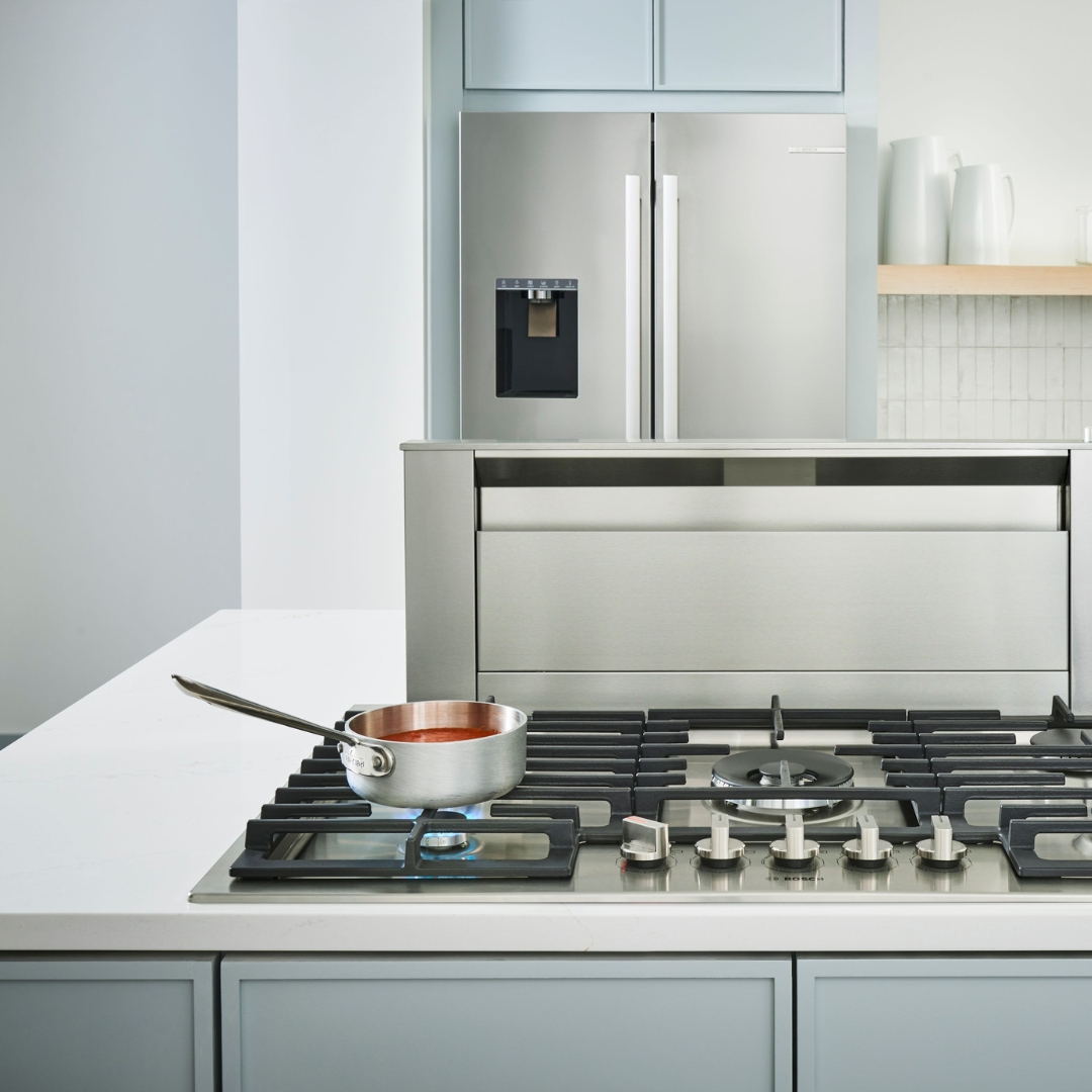 A close-up of a Bosch gas cooktop