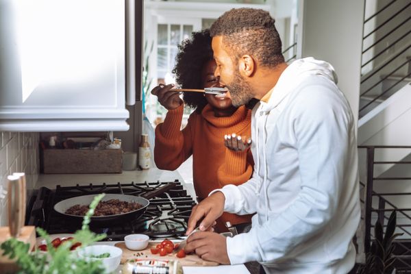 Couple Cooking Food Together