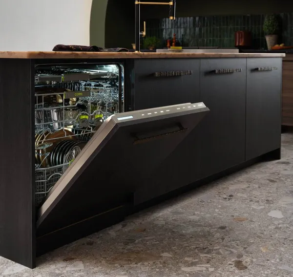 Credit: Cove An open panel ready Cove DW2451 dishwasher in a custom black front