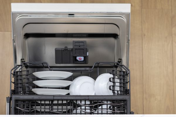 An open dishwasher shown from above 