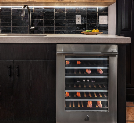 A close up of a JennAir® Undercounter Wine Cellar in a luxury kitchen." title="A close up of a JennAir® Undercounter Wine Cellar in a luxury kitchen