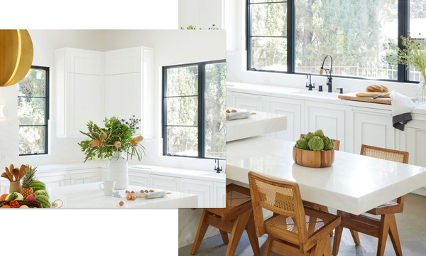 A bold, white kitchen featuring a lot of white marble and plenty of organic wood. Designed by Nina Takesh