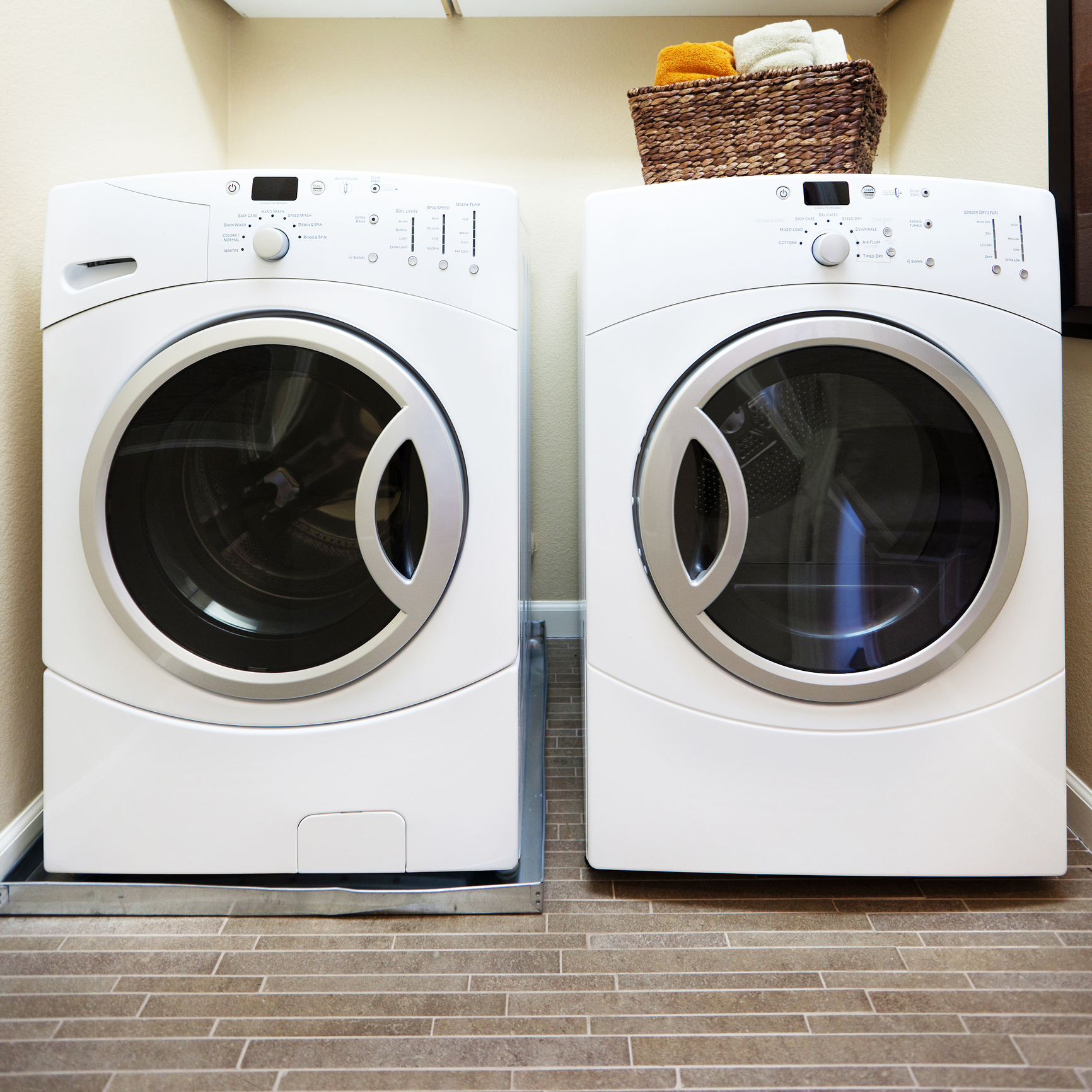 washer on pedestal and dryer