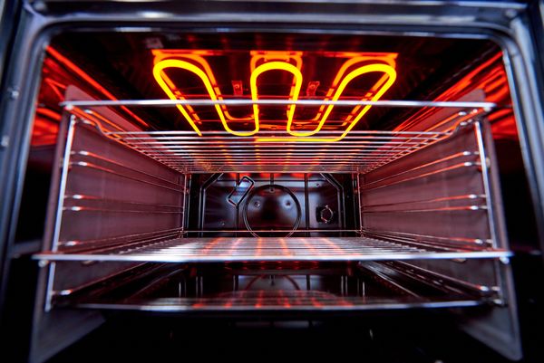 A close-up of electric oven heating elements 