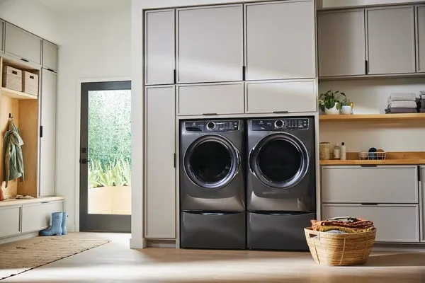 The Electrolux ELFW7637AT washer and dryer in a laundry room
