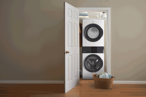 The Electrolux ELTE7300AW laundry center in a closet 