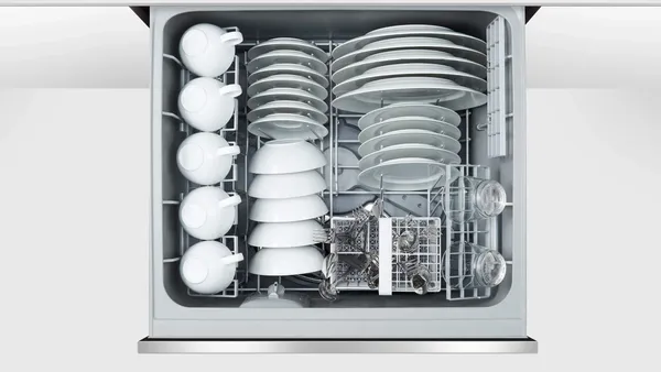 An aerial view of the Fisher & Paykel DD24DCTX9 N dish drawer loaded with dishes 
